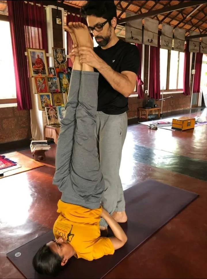Assisted yoga posture for lower back pain relief